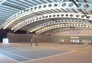 Curved steel structure building, an example of a buildings using intumescent coatings. Learn more in the Prospector Knowledge Center.