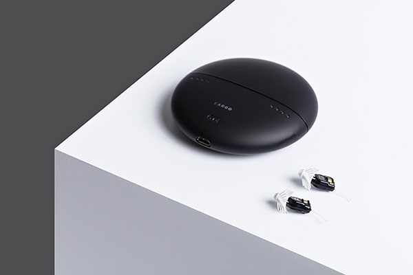 Eargo hearing aids and their charging/carrying case - learn about award-winning plastic designs in the Prospector Knowledge Center.