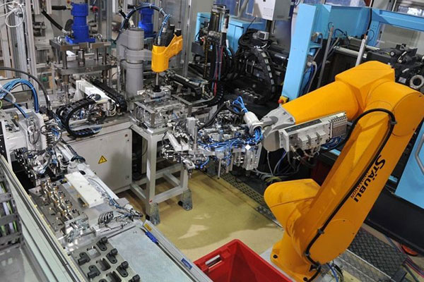 Robots-are-often-used-in-to-insert-pins-into-electrical-switches-and-connectors-and-remove-parts-from-moulds-Learn more about injection moulding here