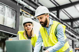 Two workers in hard hats