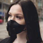 Photo of a woman wearing a face mask - Learn more about LuxMea’s bespoke face mask