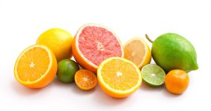 photo of several different citrus fruits