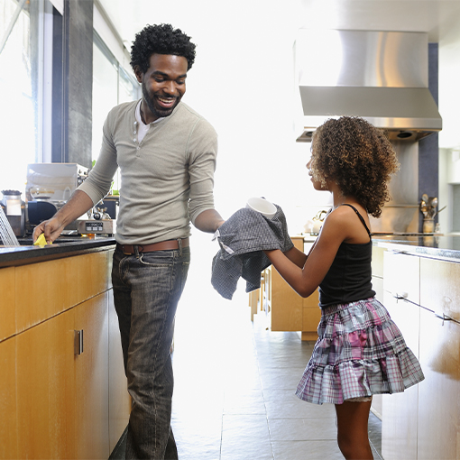 Family washing dishes