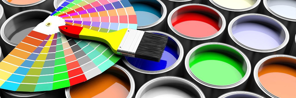 Paint swatches resting on top of open paint cans