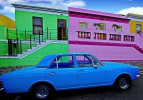 iStock-1193930563-brightly-painted-car-and-buildings-HEADER-600x400