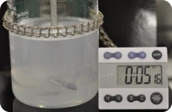 Dispersion of 1.25 g of polymeric emulsifier added 498.75 g of deionized water at about 25ºC, and agitated at about 450 rpm with a 3” marine impellor stirring blade.