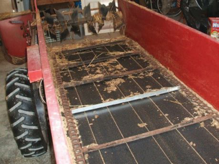 Two-wheel manure wagon - read about recent engineering improvements in manure spreader tribology in the Prospector Knowledge Center.