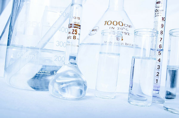 Glass flasks in a laboratory - find out what equipment you need to set up a cosmetics lab in the UL Prospector Knowledge Center.