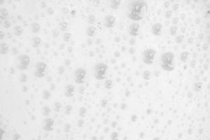 Foam bubble from soap, resulting in craters and fisheyes