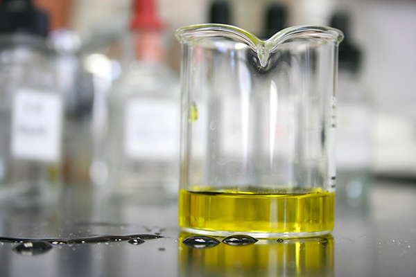 Beaker with amber liquid - Fundamentals of Polyester Resins