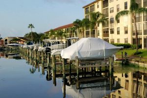 Working in conjunction with engineering firm AECOM on a remediation project, Algix used its Algix Bloom mobile harvesters in this marina in Cape Coral, Florida, which was plagued with a harmful, dense algae bloom that needed emergency relief. These “before” and “after” images were taken one day apart.