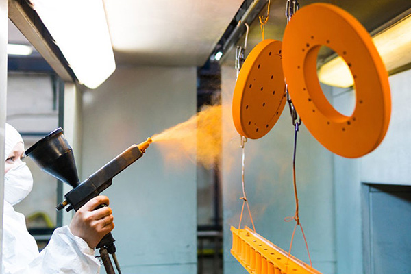 Electrostatic spray application of powder paint on metal objects