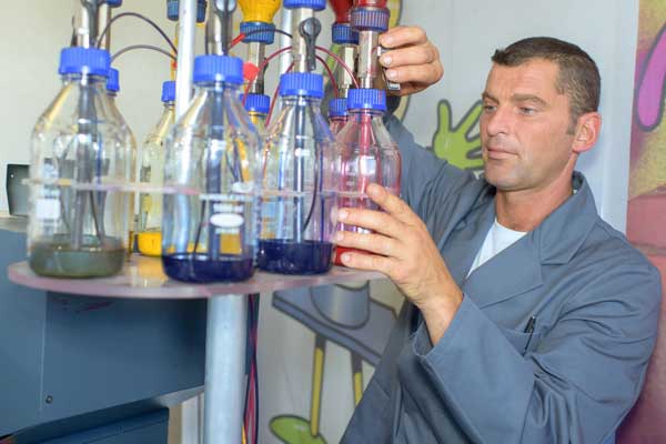 Chemist mixing paint - an introduction to titanium dioxide in the UL Prospector Knowledge Center