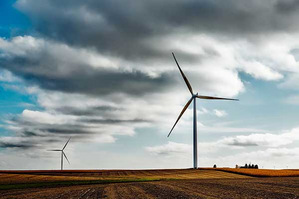 Wind farm with turbines made with plastic composites - find more plastics trends in the Prospector Knowledge Center.