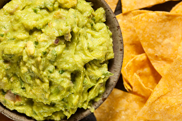Guacamole and chips - learn how the right equipment can optimize food product development and production in the Prospector Knowledge Center.