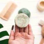 photo of a person holding a shampoo bar - Learn how to make shampoo bars