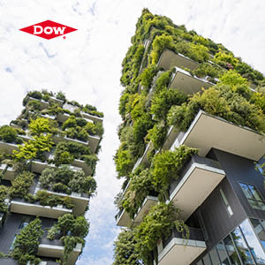 Buildings covered in foliage with Dow logo