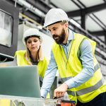 Two workers in hard hats