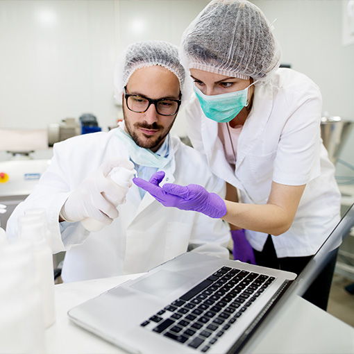 Two serious scientists checking