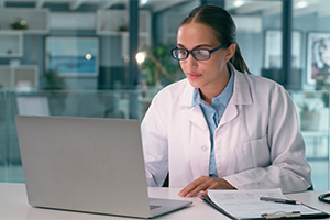 Scientist sitting at computer