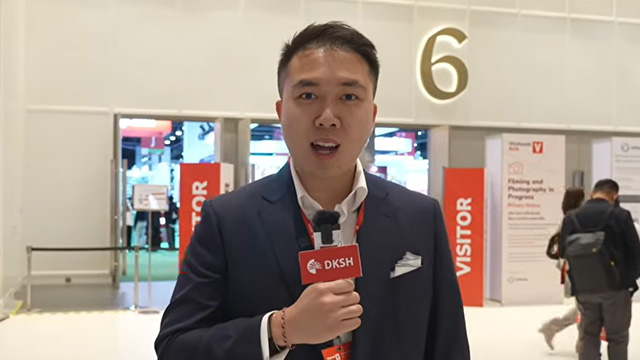 Man speaking into microphone