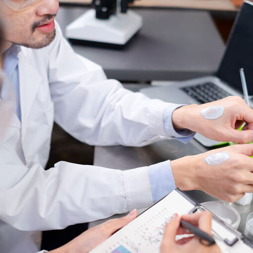 Scientists is recording while testing the result of laboratory eco or natural cosmetic, medicine, Skin care, organic make-up, beauty treatment and essential oil experiment or research and development