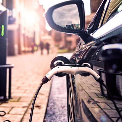 Electric Vehicle in Park Charging station in UK Street