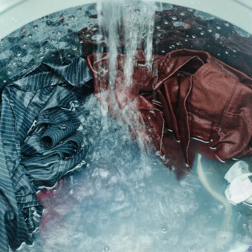 High Angle View Of Clothes Being Washed In Washing Machine